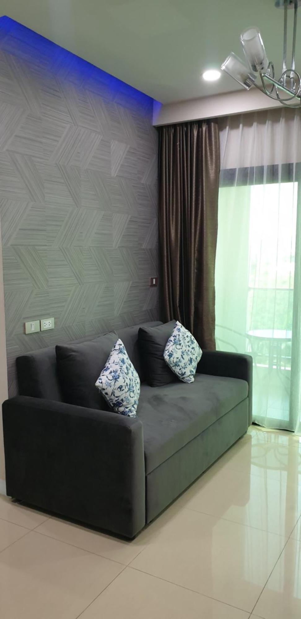 Dusit Grand Condo View Praia de Jomtien Exterior foto