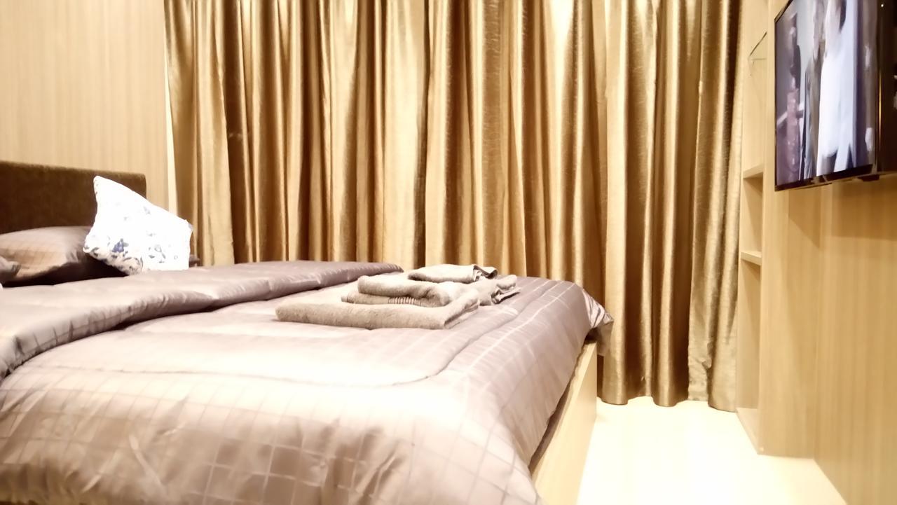 Dusit Grand Condo View Praia de Jomtien Exterior foto